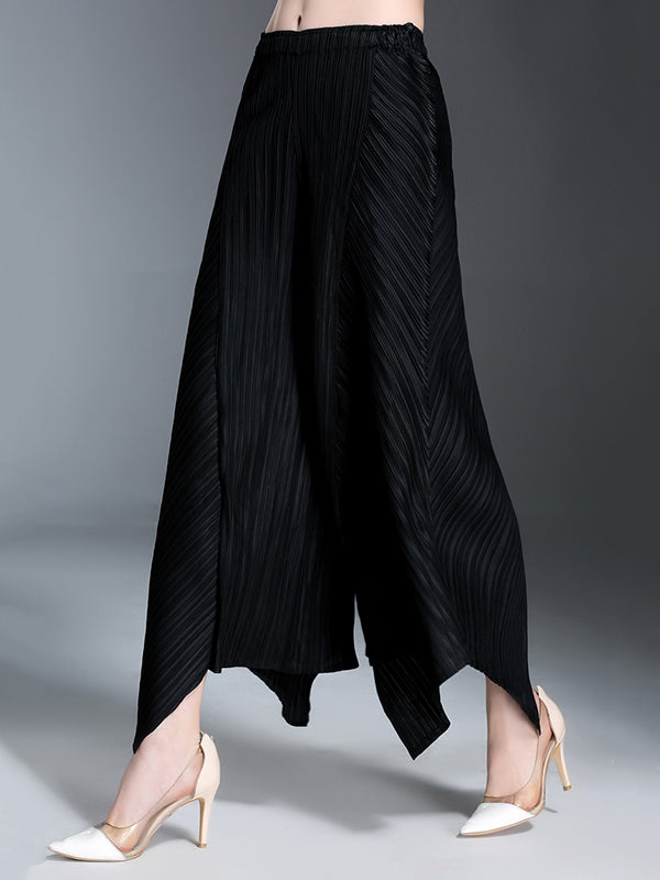 Pantalon ample original à jambes larges plissées irrégulières de couleur unie