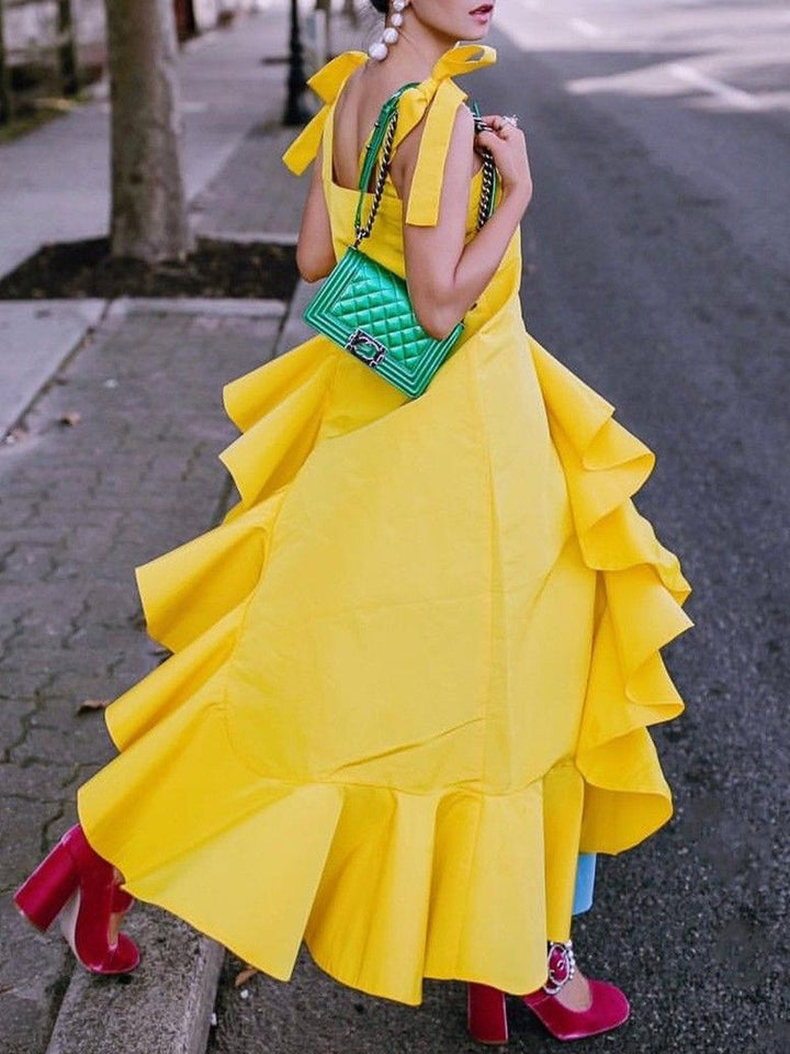 Chemisier noué à ourlet plongeant, à coupe irrégulière, bustier