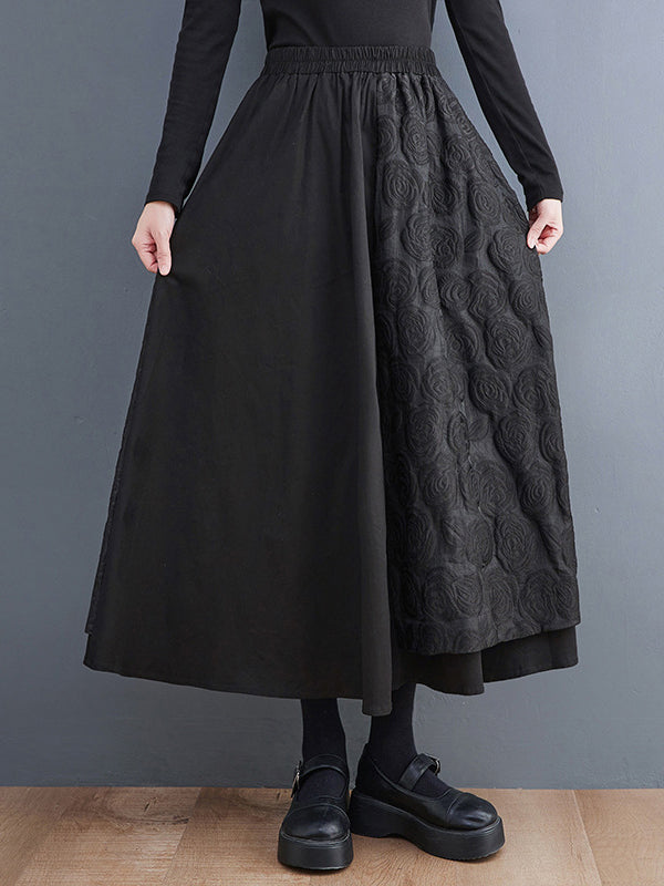 Jupe ample asymétrique coupe trapèze, à taille élastique, en jacquard, couleur unie