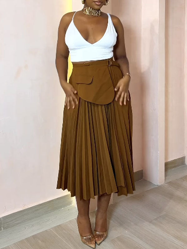 Jupe asymétrique plissée coupe trapèze, taille haute, à empiècements, couleur unie