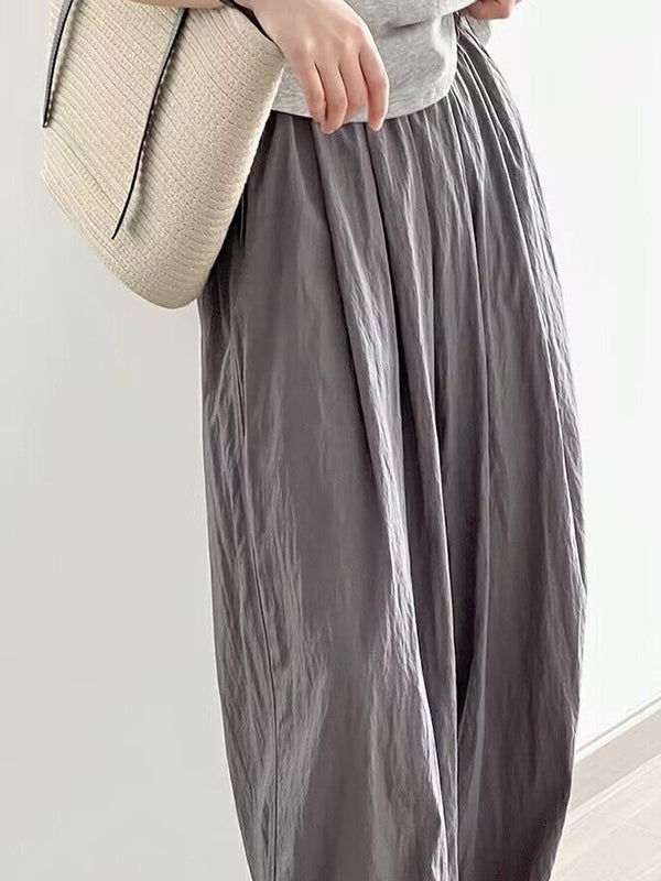 Pantalon ample plissé taille haute, à taille élastique, à poches, couleur unie