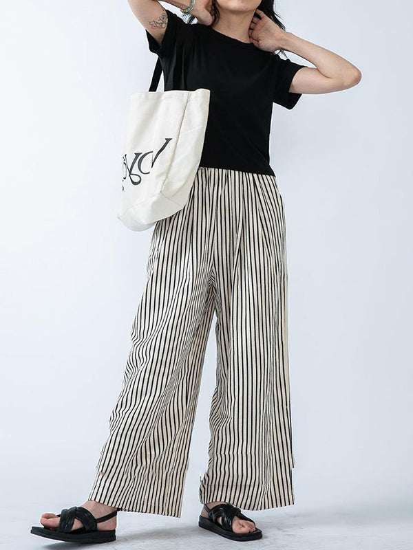 Pantalon ample rayé taille haute, à empiècements
