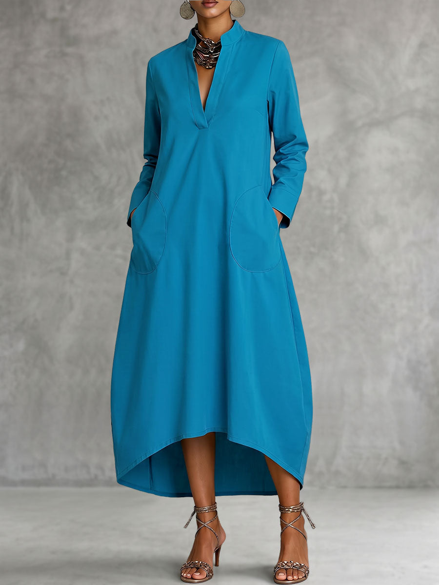 Robe mi-longue ample à poches, à manches longues, à col en V, couleur unie