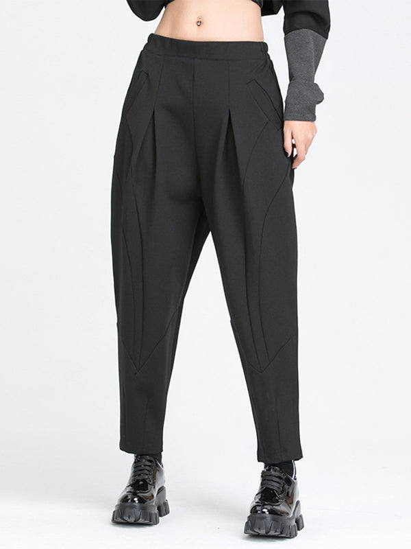 Pantalon ample plissé à taille élastique, à poches, à empiècements, couleur unie