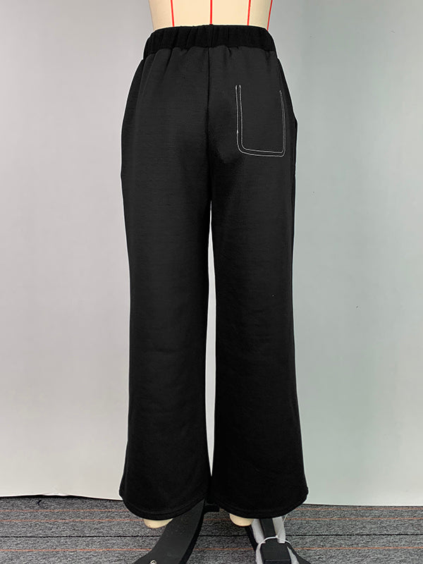 Pantalon ample taille haute, à empiècements