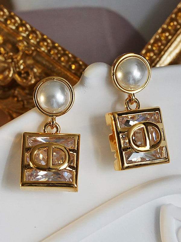 Boucles d'oreilles géométriques couleur contrastée