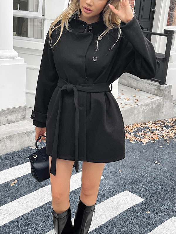 Veste ample boutonnée à manches longues, à empiècements, à taille nouée, à col montant, couleur unie