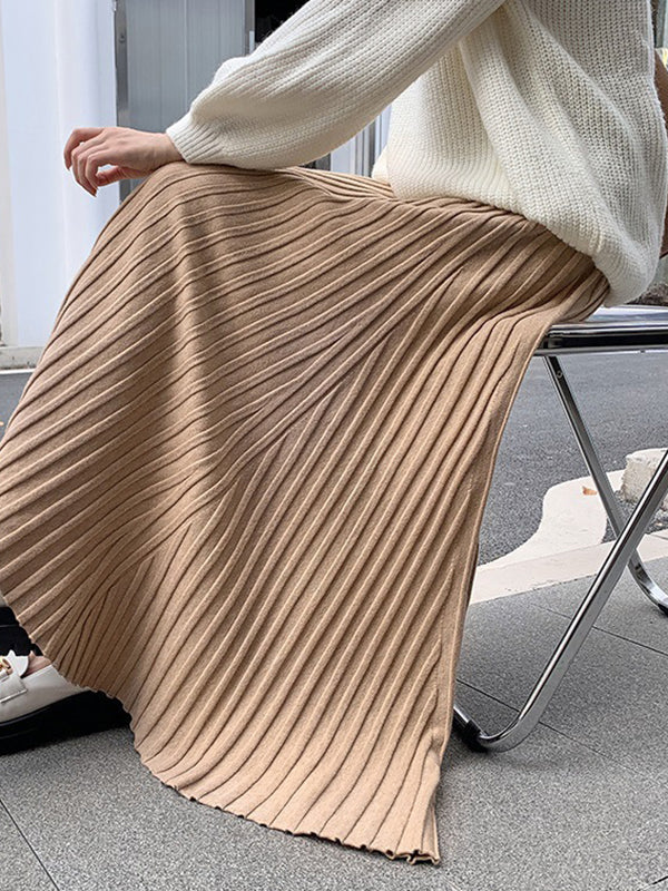 Jupe plissée coupe trapèze, taille haute, couleur unie
