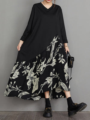 Robe mi-longue asymétrique coupe trapèze, à ourlet plongeant, à imprimé floral, à empiècements, à col en V