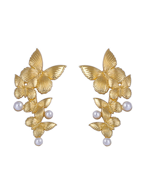 Boucles d'oreilles brillantes en forme de papillon