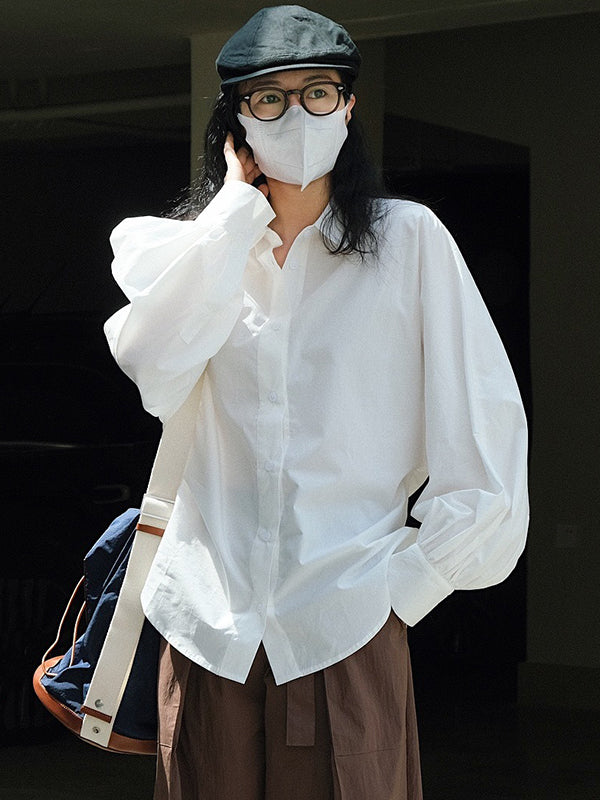 Chemisier décontracté ample à manches bouffantes, à col revers, couleur unie