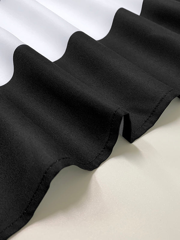 Robe longue plissée coupe trapèze, taille haute, à poches, à col rond, couleur contrastée