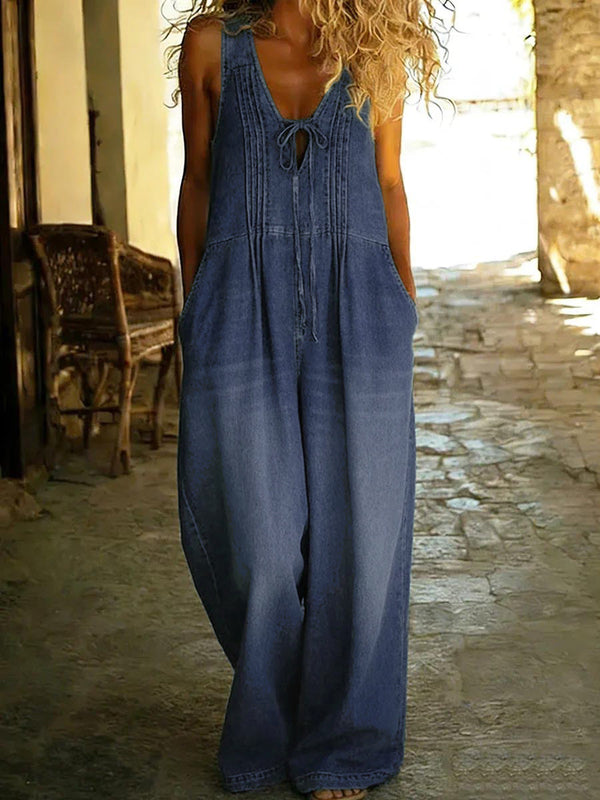 Combinaison ample ajourée plissée nouée sans manches, à poches, à empiècements, à décolleté en V profond, couleur unie
