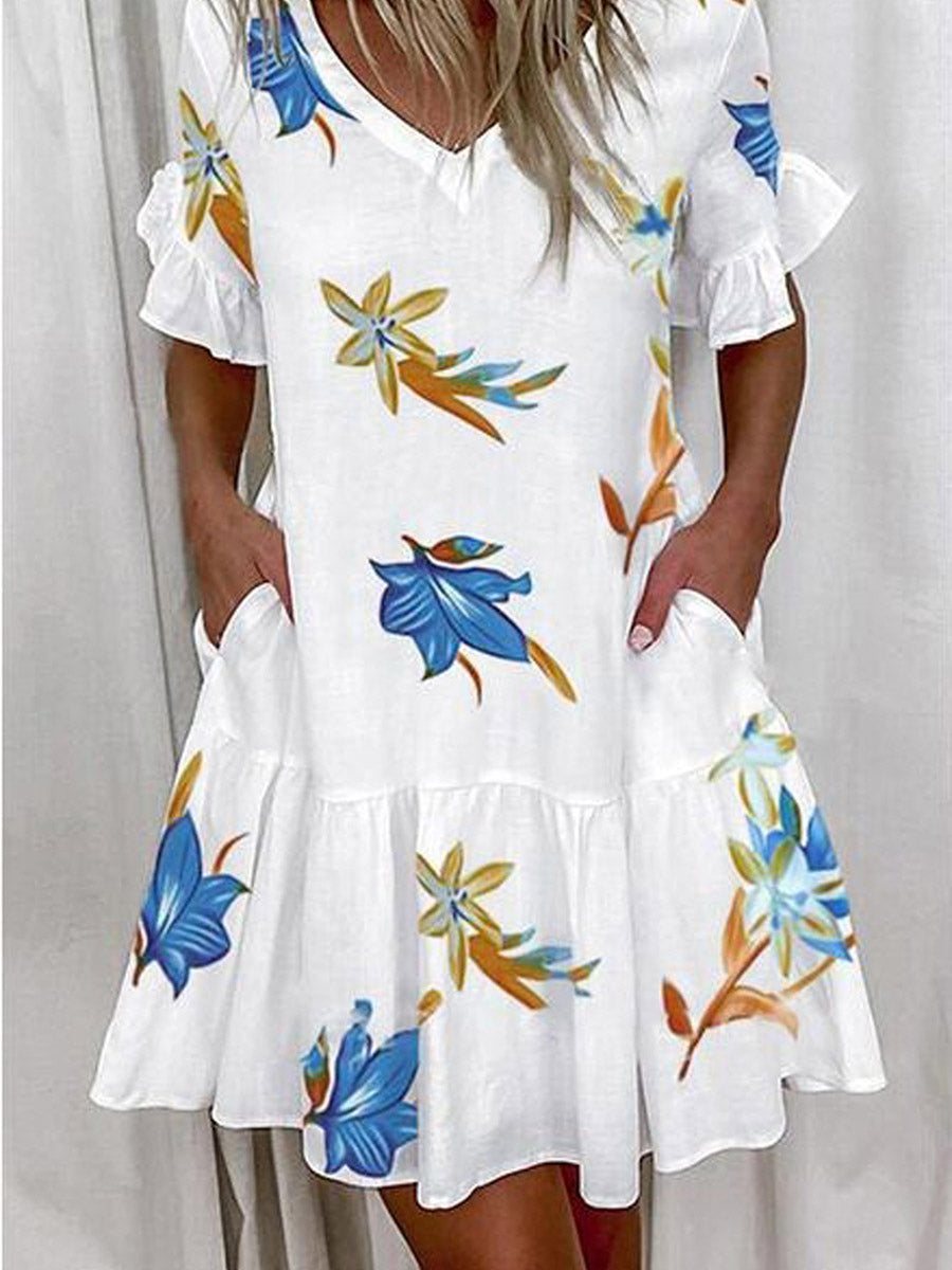 Robe mi-longue plissée imprimée coupe trapèze, taille haute, à poches, à empiècements, à col en V, couleur contrastée