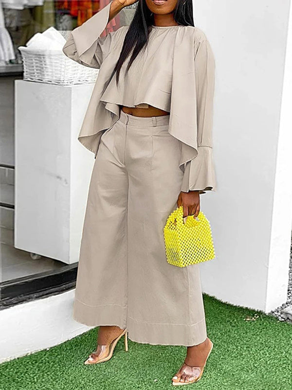 Pantalon à jambes larges, à empiècements, couleur unie