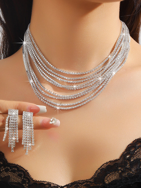 Parure boucles d'oreilles pendantes et collier superposée
