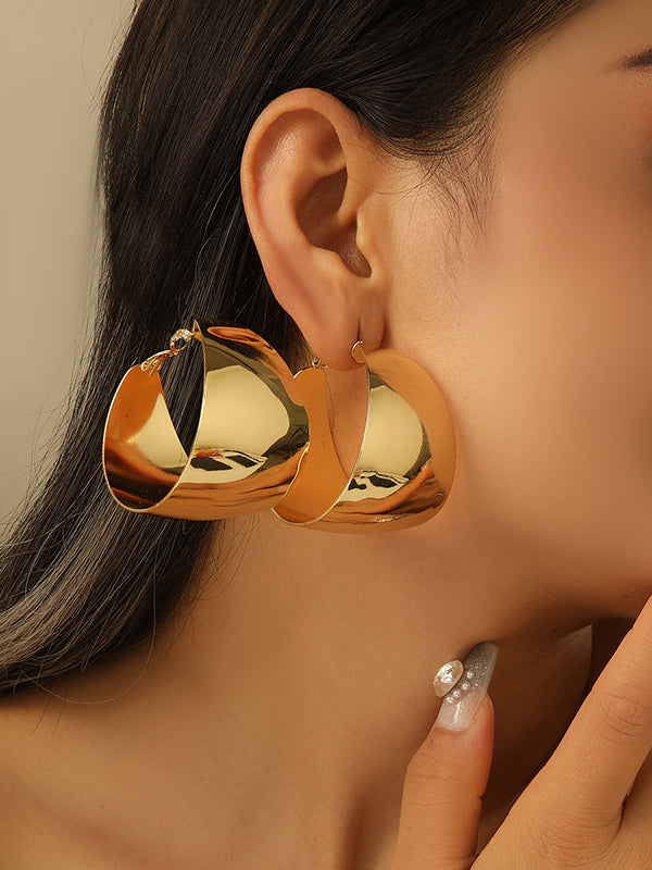Boucles d'oreilles géométriques brillantes couleur unie