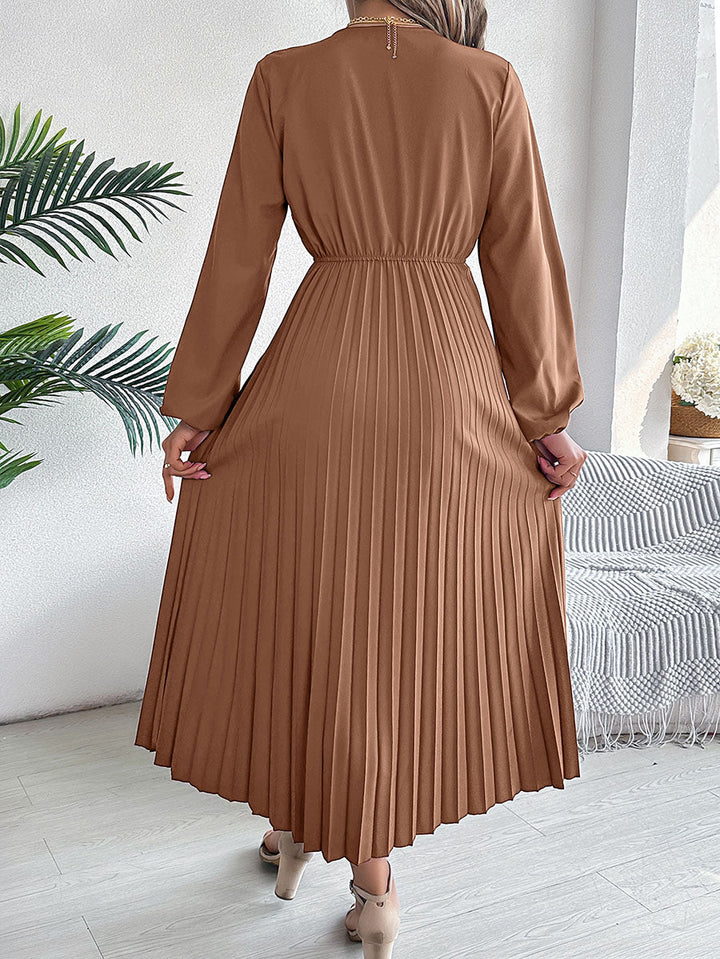 Robe longue plissée coupe trapèze, taille haute, à taille élastique, à col en V, couleur unie