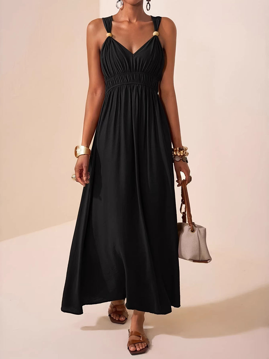 Robe longue ample plissée coupe trapèze, à fines bretelles, couleur unie