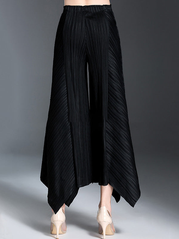 Pantalon ample original à jambes larges plissées irrégulières de couleur unie