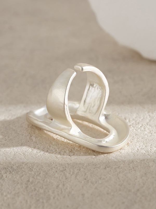 Bague réglable géométrique ajourée couleur unie