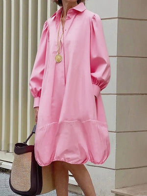 Robe mi-longue ample boutonnée plissée à manches longues, à poches, à col revers, couleur unie
