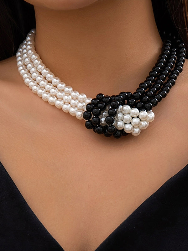 Collier perlé à empiècements