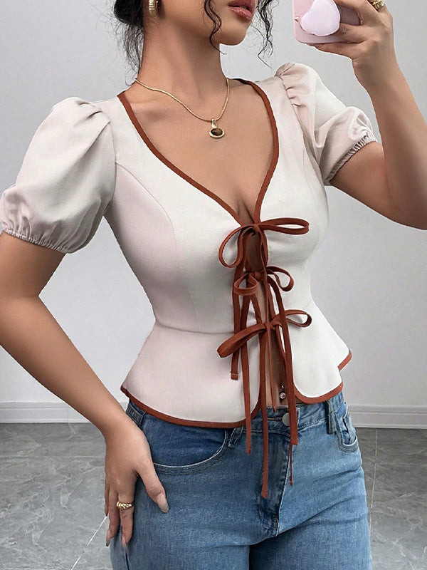 Chemisier plissé noué ample à taille élastique, à manches bouffantes, à col en V