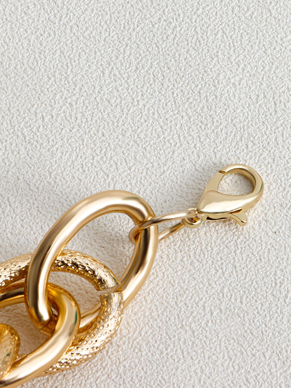 Parure collier et bracelet ajourée couleur unie