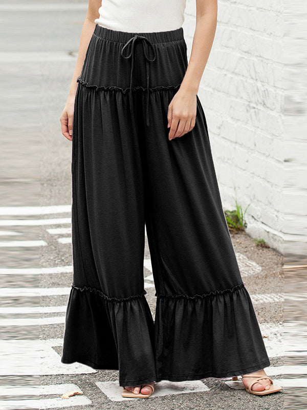 Pantalon ample plissé taille haute, couleur unie
