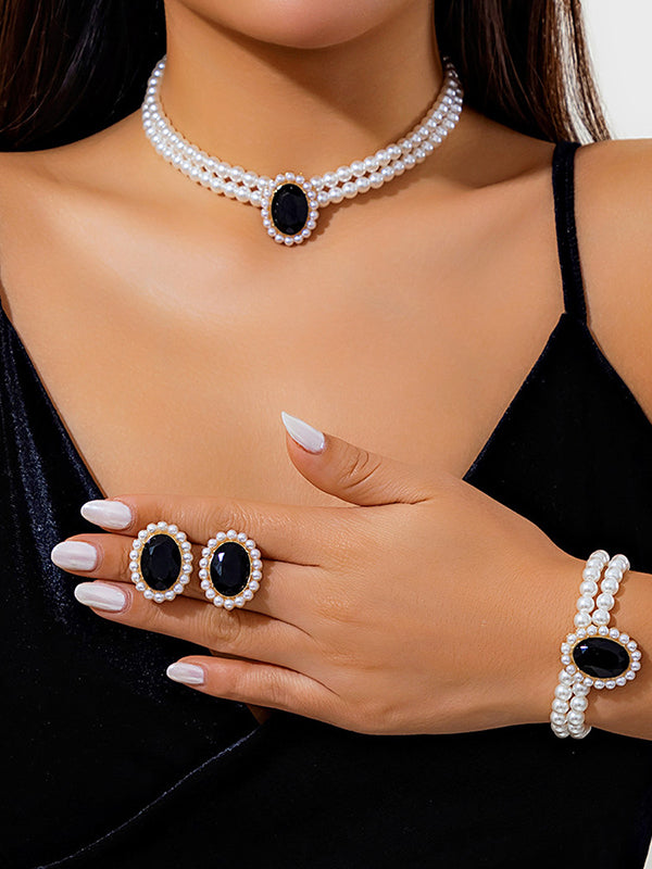 Parure collier et boucles d'oreilles géométrique superposée à strass