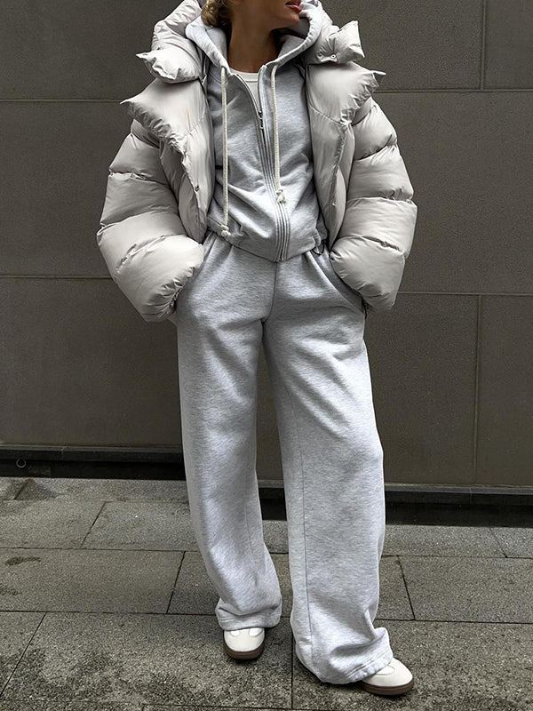 Manteau ample matelassé à manches longues, à empiècements, à capuche, couleur unie