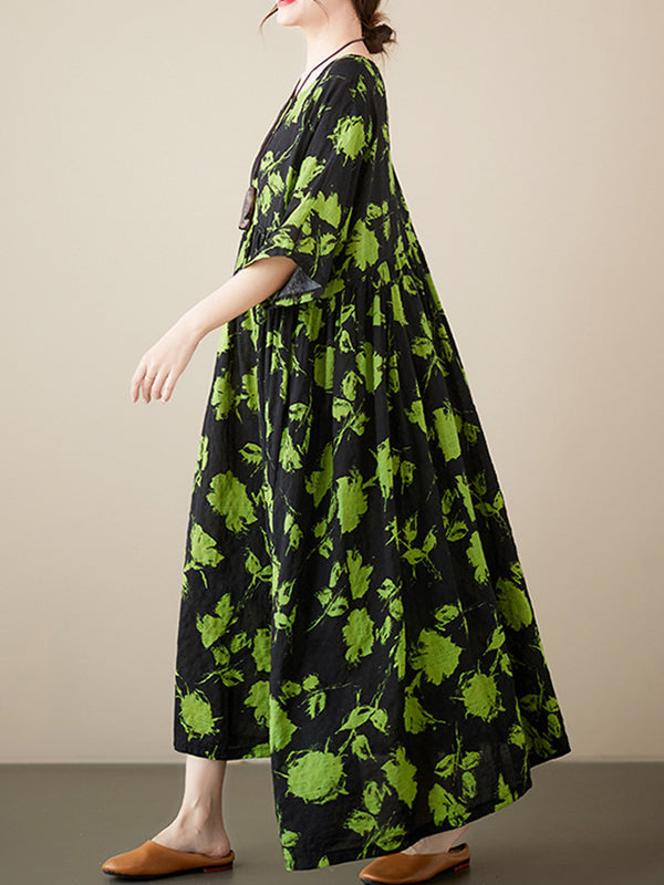 Robe mi-longue ample plissée à fleurs, à col rond