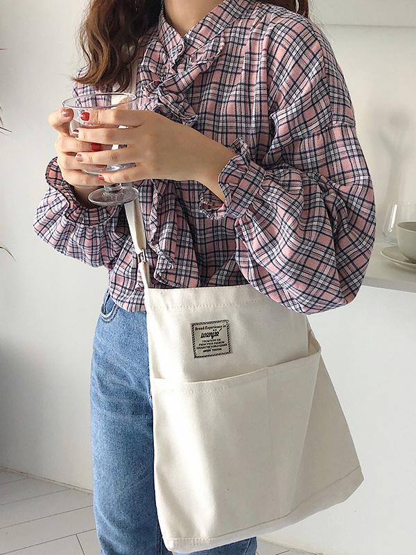 Sac à main simple en toile de couleur unie avec poches
