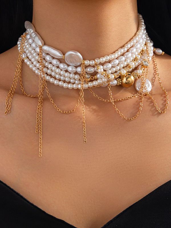 Collier géométrique superposé à pompons