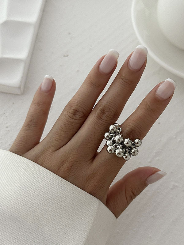 Bague perlée géométrique couleur unie
