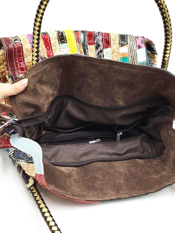 Sac en cuir à bandoulière rayé à empiècements