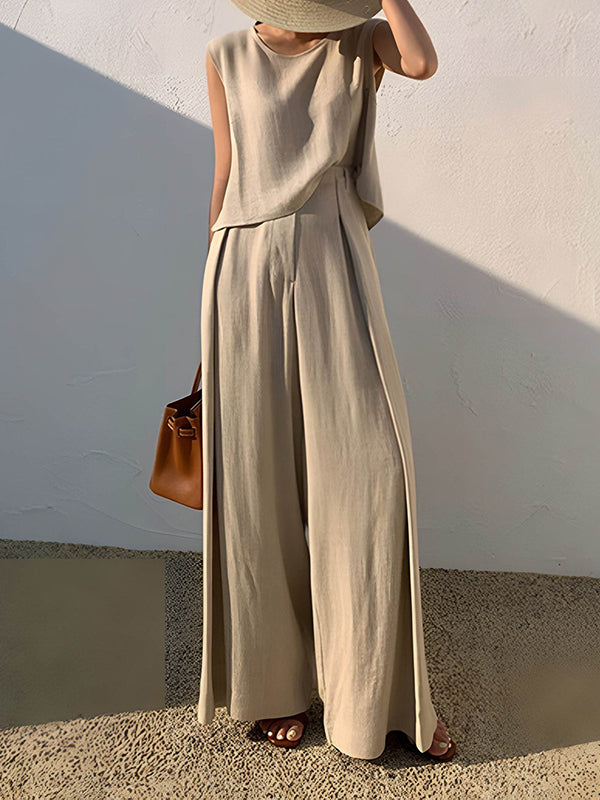 Pantalon ample plissé taille haute, à empiècements, couleur unie