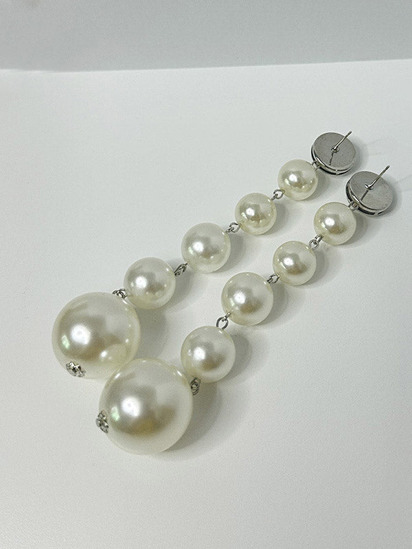Boucles d'oreilles perlées géométriques brillantes