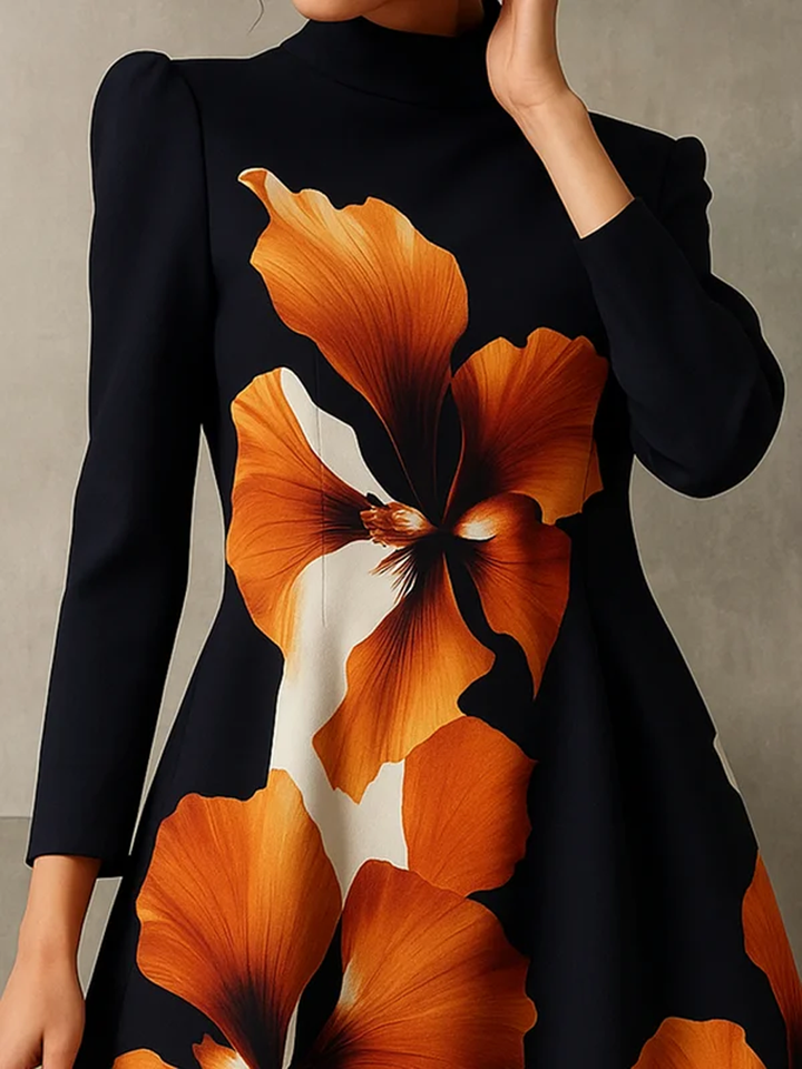 Robe mi-longue coupe trapèze, à manches longues, à imprimé floral, à col cheminée, couleur contrastée