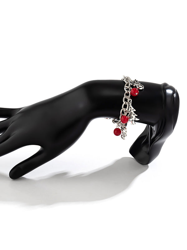 Bracelet géométrique à pompons