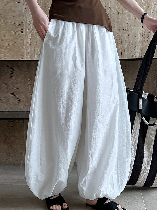 Pantalon taille haute, à taille élastique, à empiècements, couleur unie