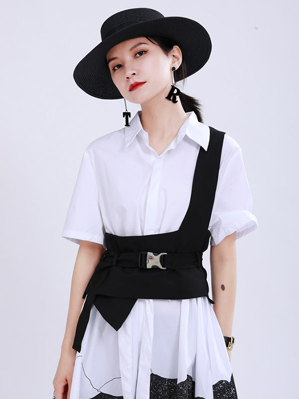 Gilet noir avec boucle de ceinture élégante