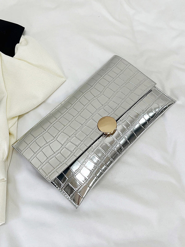 Sac à main géométrique brillant à empiècements