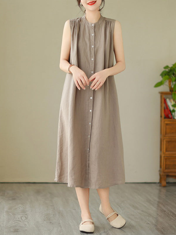 Robe mi-longue boutonnée plissée coupe trapèze, sans manches, à col rond, couleur unie