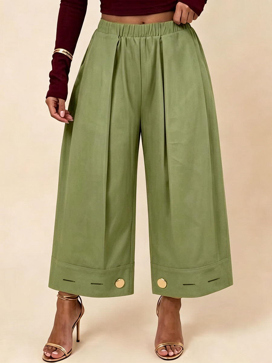 Pantalon plissé boutonné ample à poches, à taille élastique, à jambes larges, couleur unie
