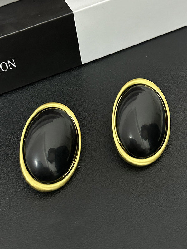 Boucles d'oreilles géométriques à empiècements