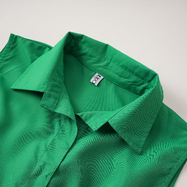 Robe mi-longue sans manches, à col revers, couleur unie
