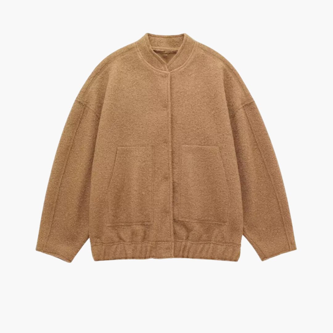 Veste oversized pour femmes avec design à l'avant ouvert et poches plaquées