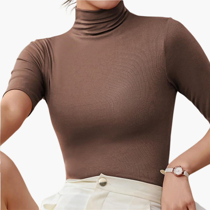 Pull à col roulé pour femmes avec demi-manches et design sans couture